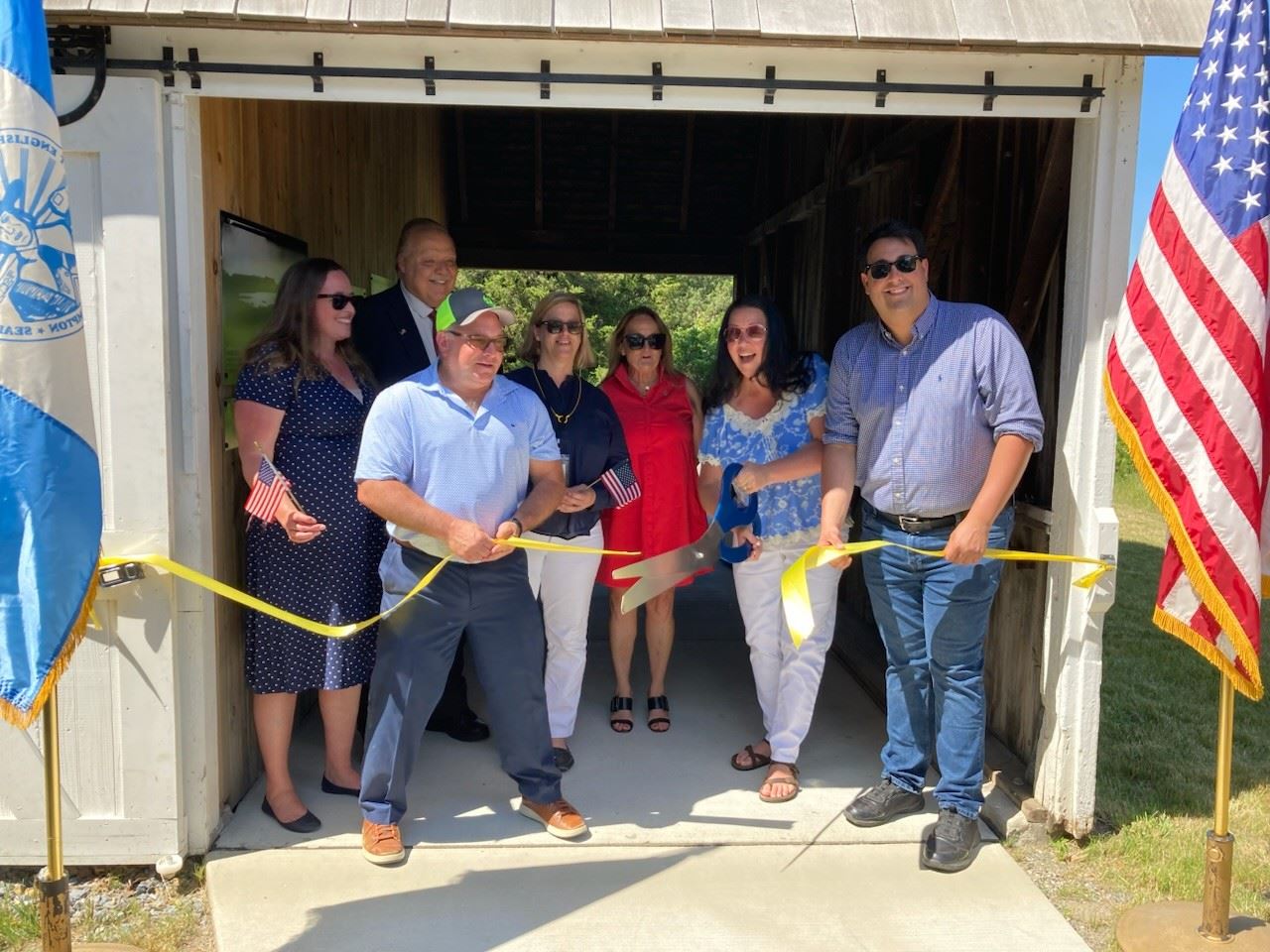 Councilwoman McNamara cuts the ribbon